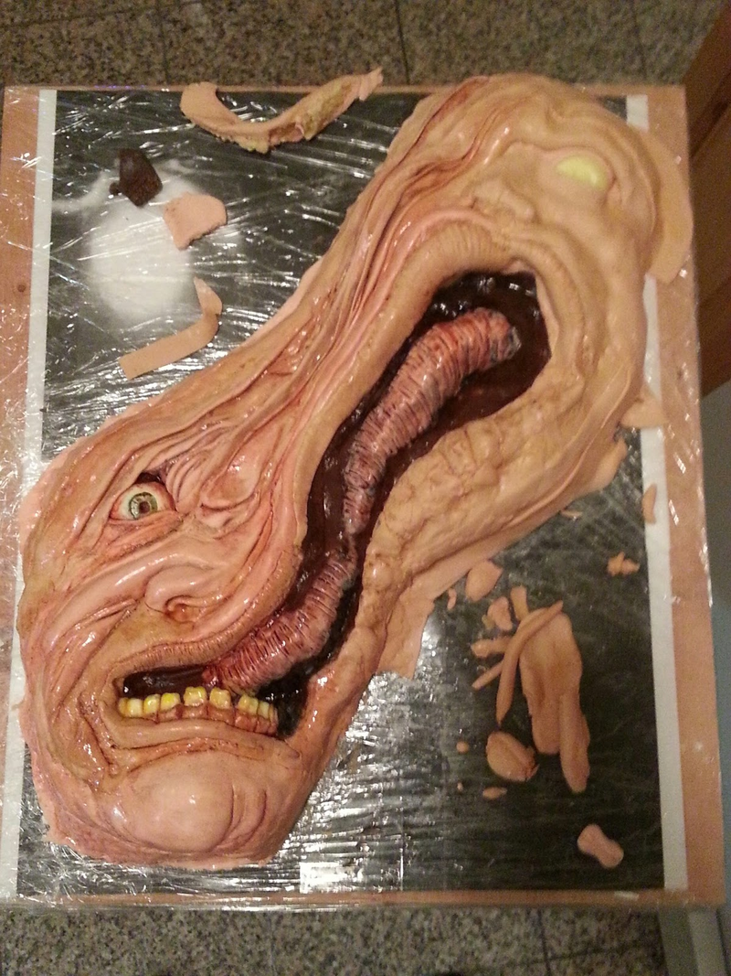 Illustration for article titled Totally Revolting Birthday Cake Shaped Like "Split-Face" from The Thing